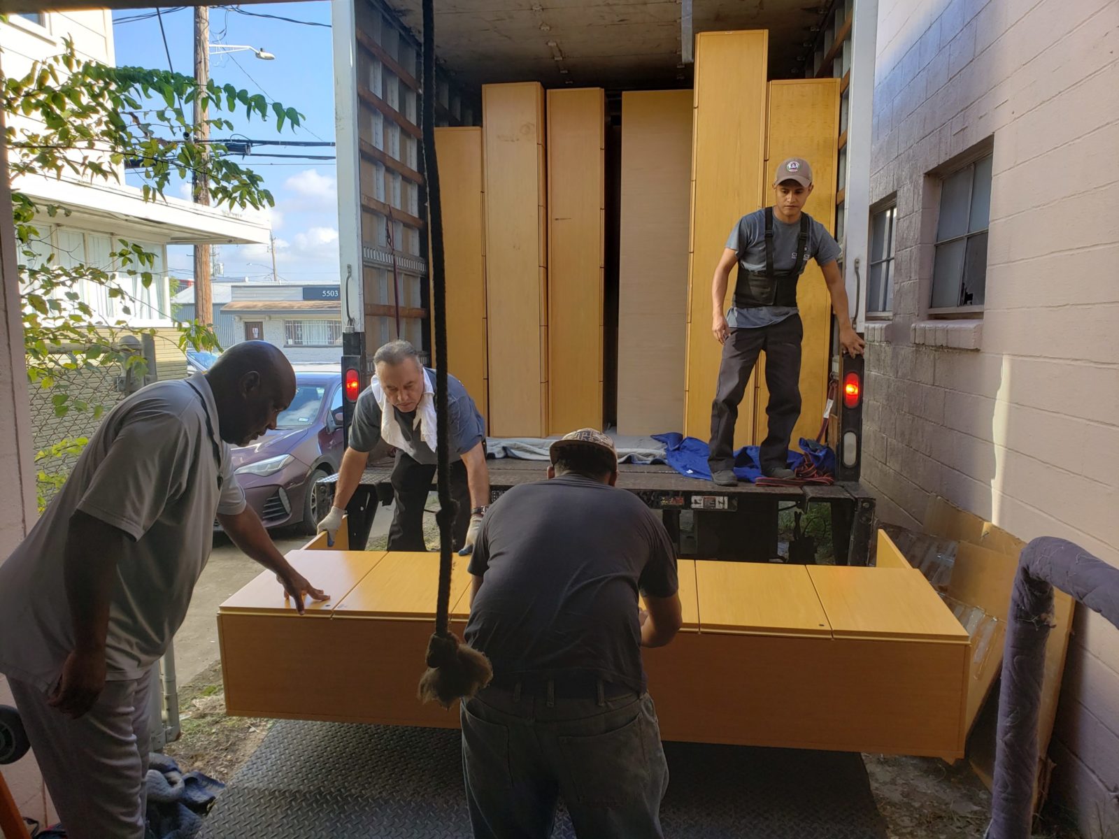 Furniture coming off truck