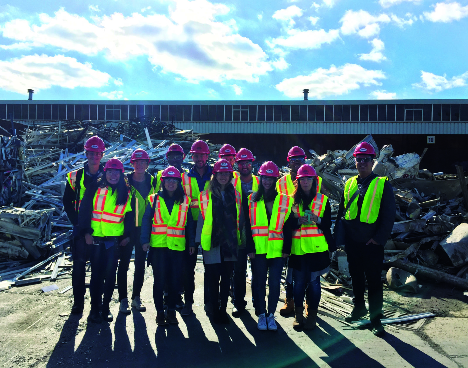 Green Standards employees gather at recycling plant